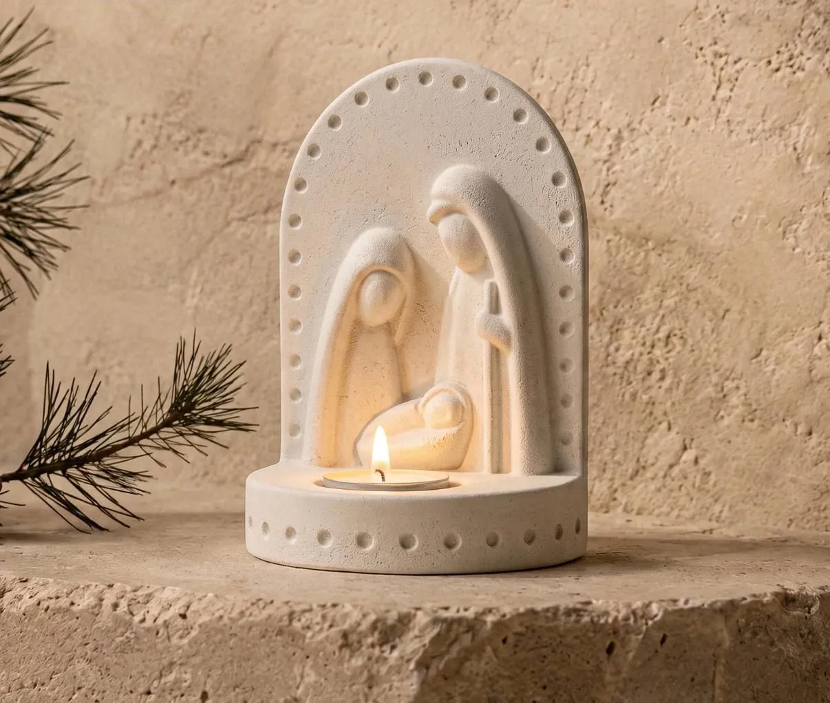 Handcrafted nativity scene tealight holder glowing warmly
